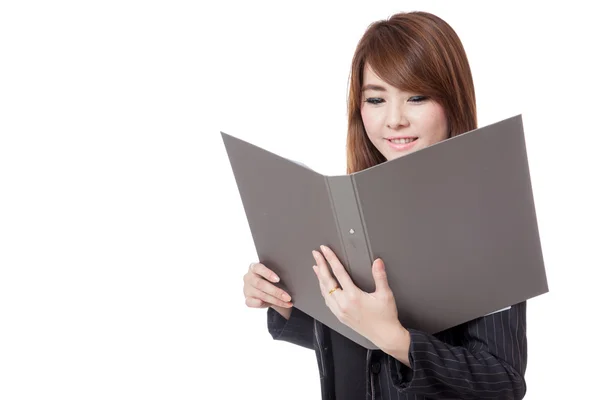 Asian office girl  read data from folder and smile — Stock Photo, Image