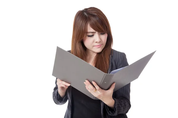 Asian office girl unhappy read data from folder — Stock Photo, Image