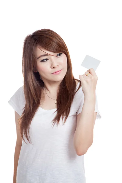 Asiática chica mira a un blanco tarjeta y sonrisa —  Fotos de Stock
