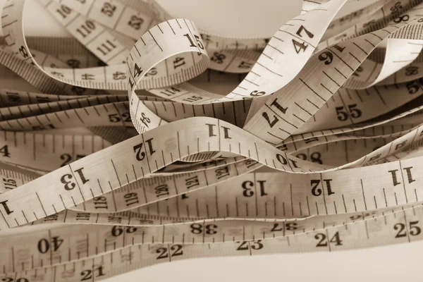 Untidy measuring tapes — Stock Photo, Image