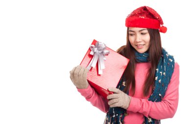 Asian girl with red christmas hat show a gift box