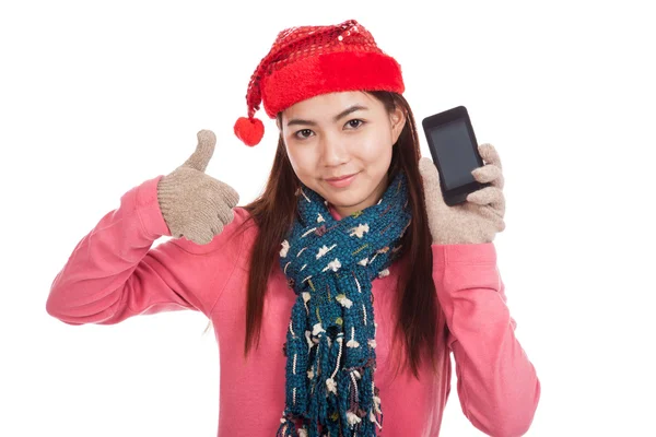 Asiática chica con rojo navidad sombrero mostrar pulgares arriba y móvil pho —  Fotos de Stock