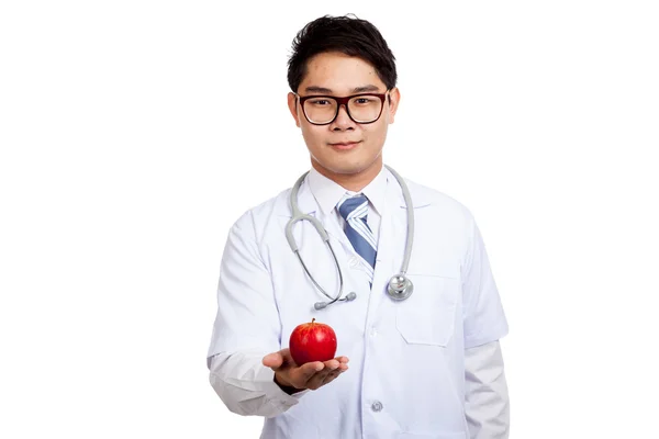 Aziatische mannelijke arts met rode appel — Stockfoto