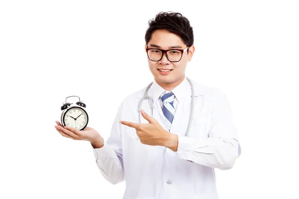 Asian male doctor point to a clock — Stock Photo, Image