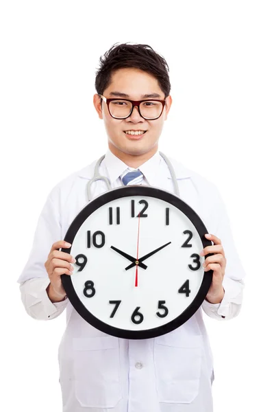 Asian male doctor show a clock — Stock Photo, Image