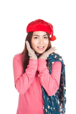 Güzel Asyalı kız kırmızı Noel şapka ile