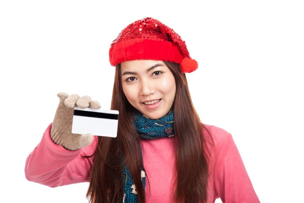 Azjatyckie dziewczyny z czerwonym Boże Narodzenie kapelusz uśmiech Pokaż kartą — Zdjęcie stockowe