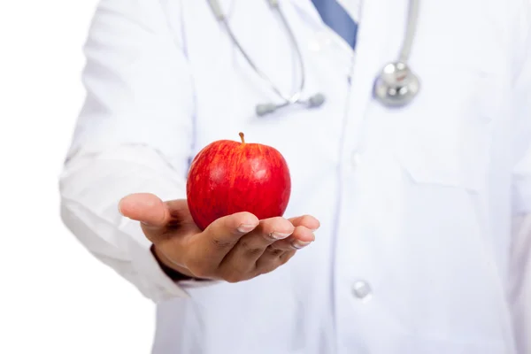 Asian male doctor with red apple on palm hand — Stock Photo, Image