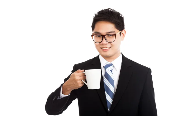 Asiatisk affärsman med en kopp kaffe — Stockfoto