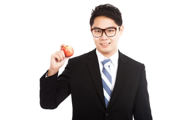 Saludable hombre de negocios asiático con manzana roja —  Fotos de Stock