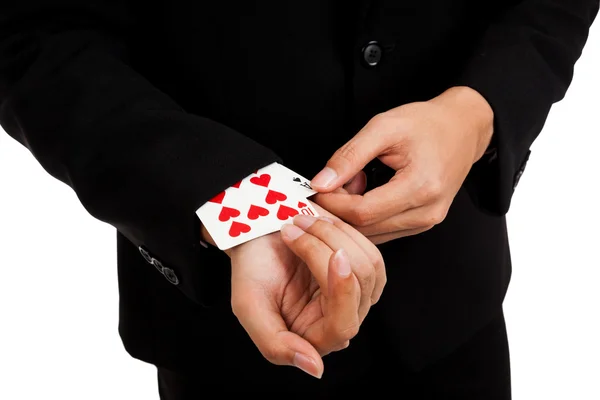 Podvádění asijské podnikatel z hrací karty z rukávu — Stock fotografie