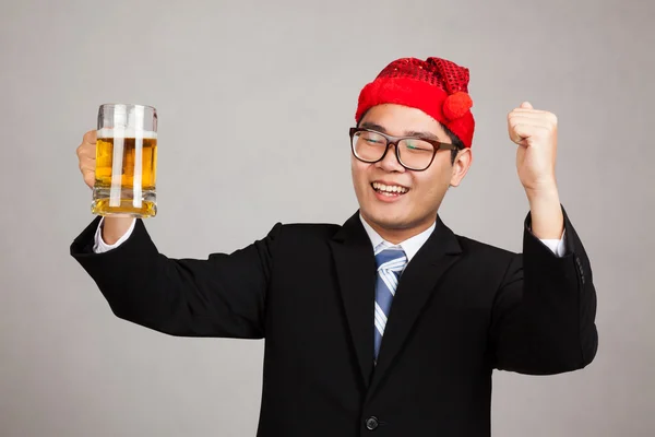 Happy Asian businessman with party hat and  beer — Stock Photo, Image