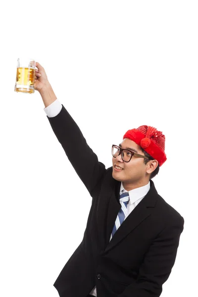 Asiatico uomo d'affari con rosso natale cappello applausi con tazza di ape — Foto Stock