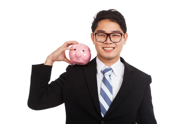 Asian businessman hold a pink piggy bank — Stock Photo, Image