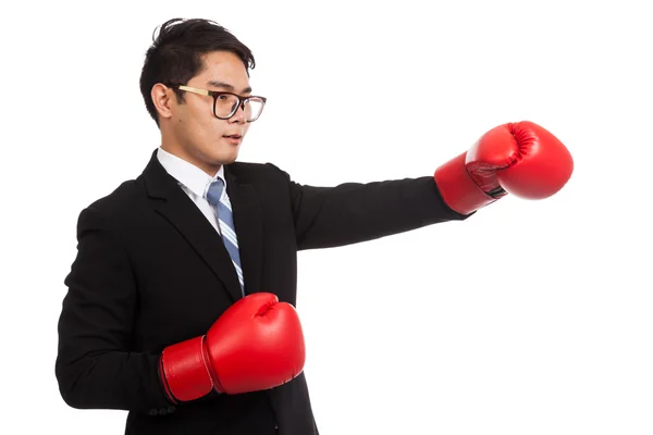 Asian businessman punch with red boxing glove — Stock Photo, Image