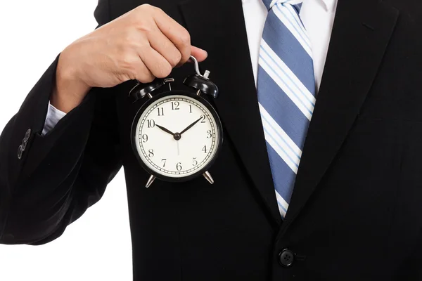 นักธุรกิจเอเชียที่มีนาฬิกาปลุก — ภาพถ่ายสต็อก