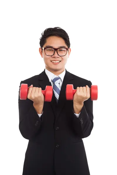 Asian businessman smile with red dumbbells — Stock Photo, Image