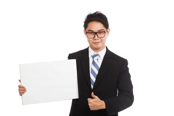 Asiatische Geschäftsmann Daumen hoch mit leerem Schild und Lächeln Stockfoto