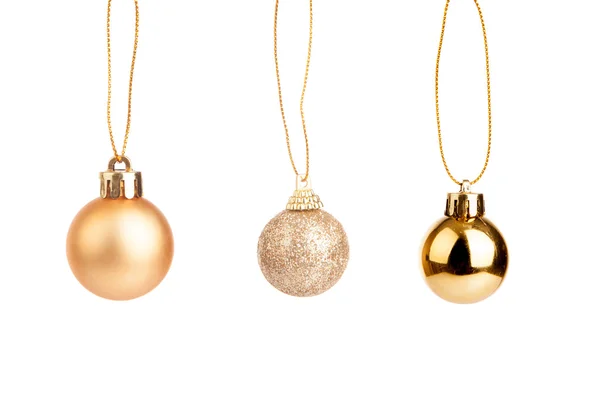 Three of gold christmas tree baubles — Stock Photo, Image