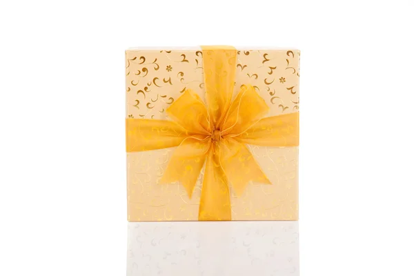 Golden gift box with golden bow — Stock Photo, Image