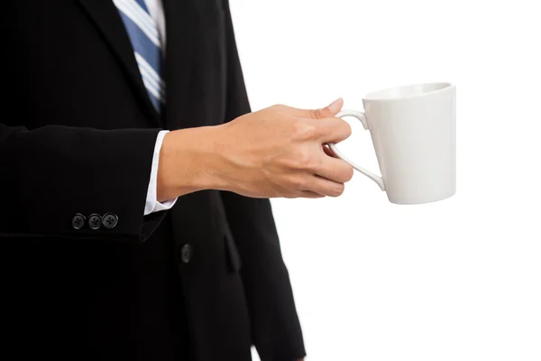 Asiático hombre de negocios celebrar un taza de café — Foto de Stock