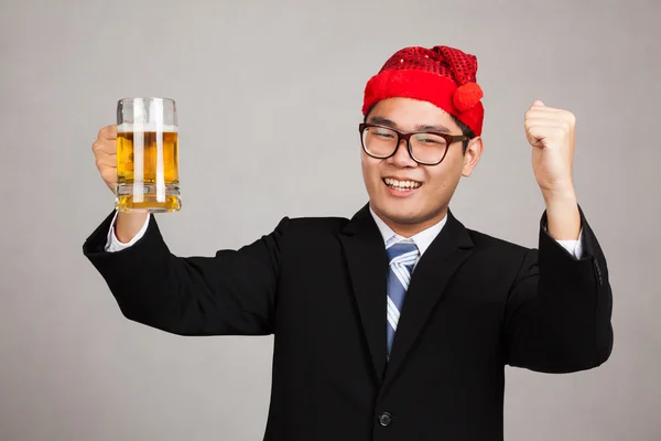 Happy Asian businessman with party hat and  beer — Stock Photo, Image