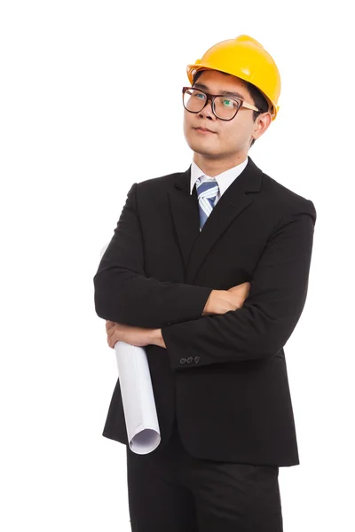 Asian engineer man think of something with blueprints Stock Image