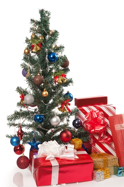 Christmas tree with  many gift boxes — Stock Photo, Image