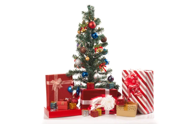 Christmas tree with  many gift boxes — Stock Photo, Image