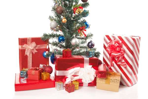 Christmas tree with  many gift boxes — Stock Photo, Image