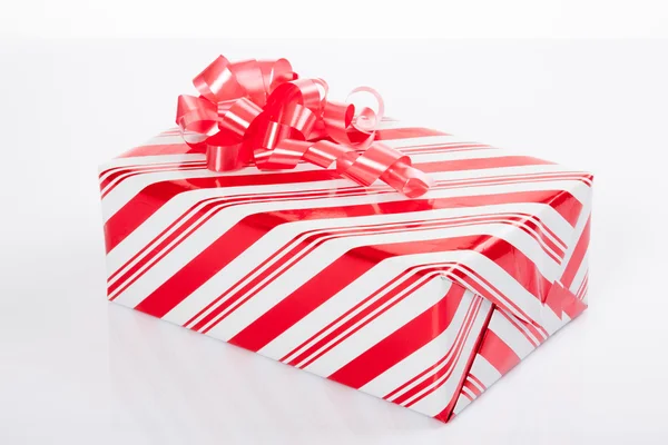 Red gift box with red bow for christmas — Stock Photo, Image