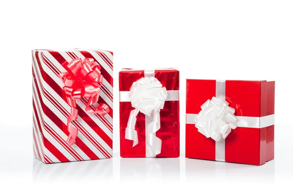 Três caixas de presente vermelho para o Natal — Fotografia de Stock