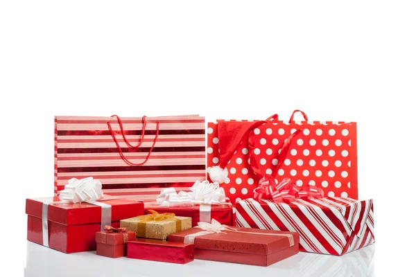 Red gift boxes and shopping bags — Stock Photo, Image