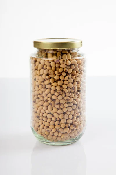 Soybeans in a jar with lid close — Stock Photo, Image