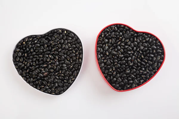 Frijoles negros en forma de corazón — Foto de Stock