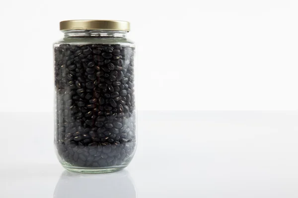 Black beans in a jar with close lid — Stock Photo, Image