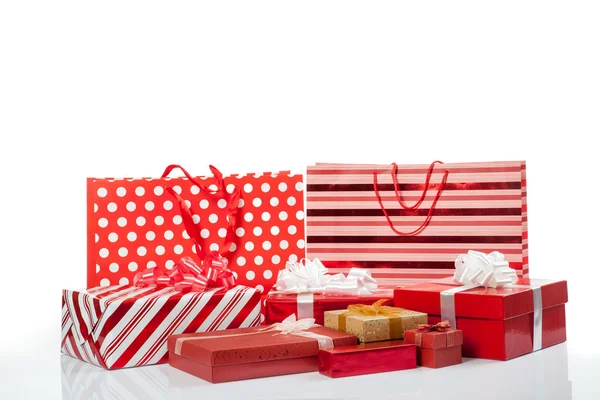 Red gift boxes and shopping bags — Stock Photo, Image