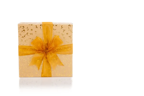 Golden gift box with golden bow — Stock Photo, Image
