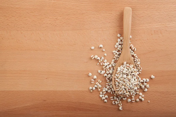 Jobs tears with wooden spoon — Stock Photo, Image