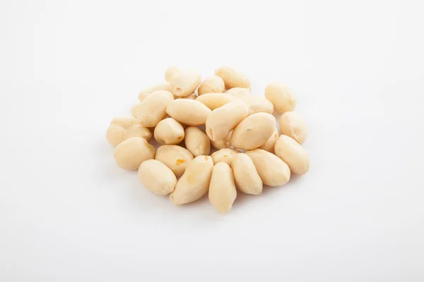 Peeled peanuts on white background — Stock Photo, Image