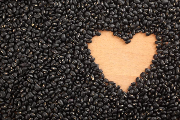 Svarta bönor med hjärta form utrymme — Stockfoto
