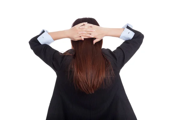 Back of young Asian businesswoman with hands on her head — Stock Photo, Image