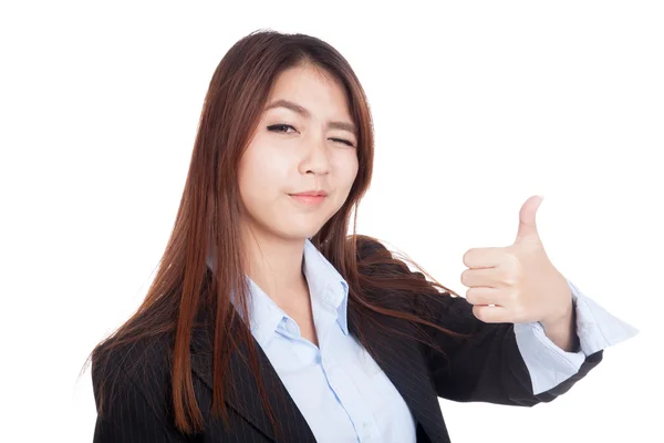 Young Asian businesswoman winks her eye and thumbs up — Stock Photo, Image