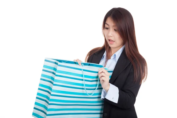 Young Asian businesswoman surprise look inside shopping bag — Stock Photo, Image