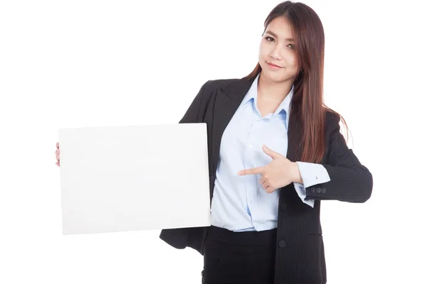 Joven mujer de negocios asiática apuntan a signo en blanco — Foto de Stock