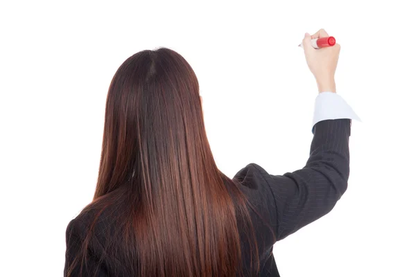 Achterkant van jonge Aziatische zakenvrouw schrijven met rode marker — Stockfoto