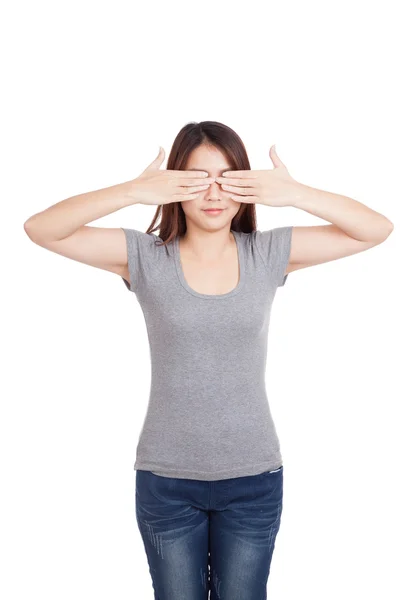 Young Asian woman close  eyes with both hands — Stock Photo, Image