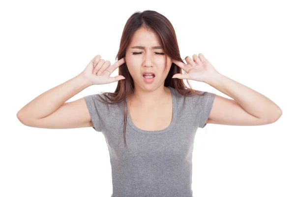 Young Asian woman covering her ears — Stock Photo, Image