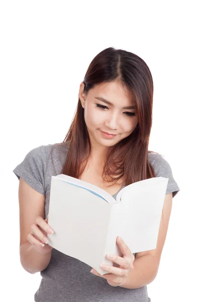 Junge asiatische Frau mit einem Buch — Stockfoto