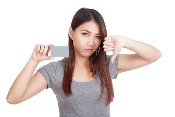 Young Asian woman thumbs down with blank card — Stock Photo, Image